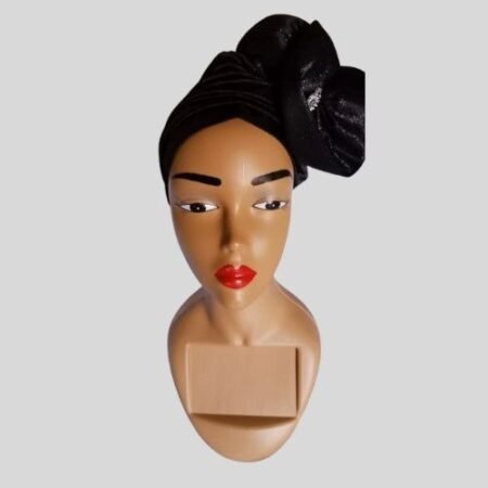 A non-stretchy , shining black turban cap